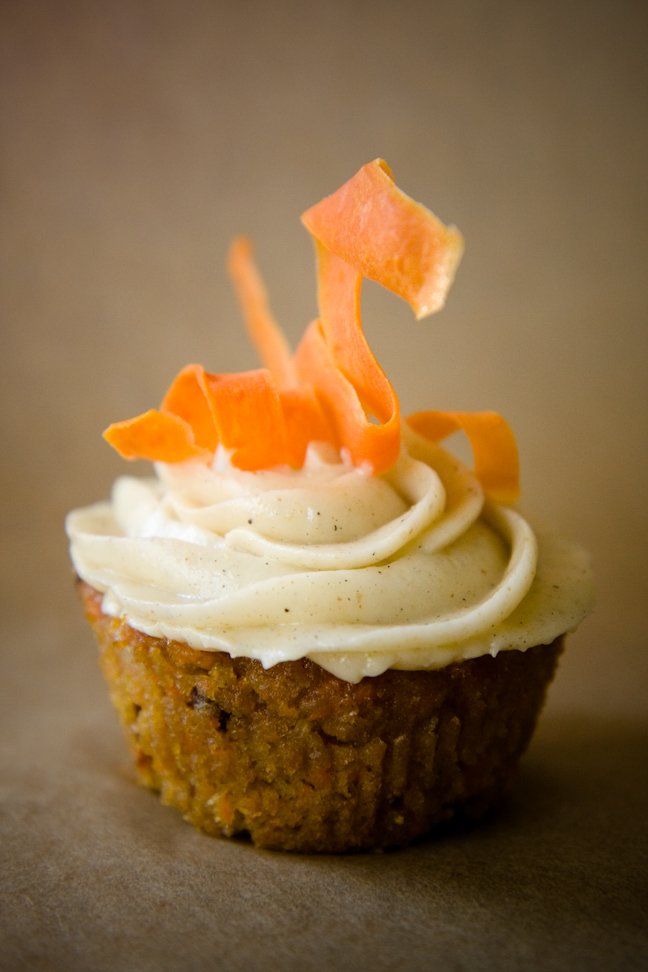 Carrot cake cupcakes topped with candied carrot curls