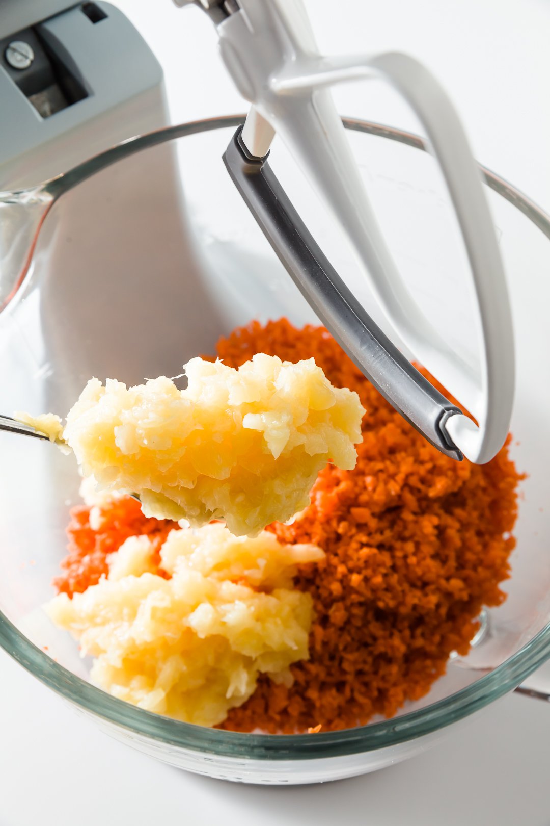 Adding pineapple to carrot cake batter