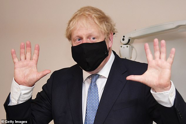 The Prime Minister declined to put a precise time scale on the new rules requiring people to wear a face covering in all shops or face a £100 fine